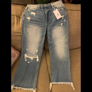Vervet distressed blue jeans. Frayed hem and 90’s vintage flare (Leslie).